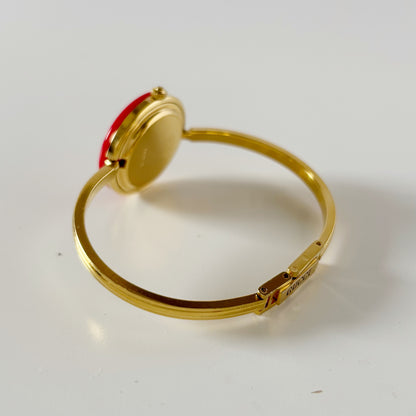 Gucci 1990s Interchangeable Bezel Gold Plated Bangle Watch with 12 bezels, case