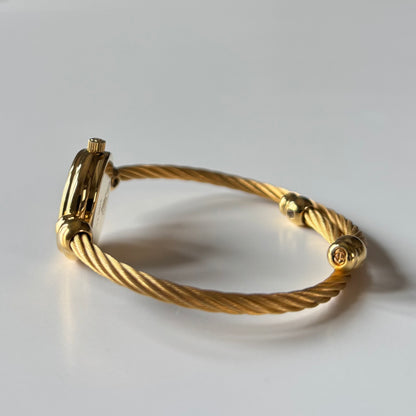 Gucci 1990s Black Round Dial Cable Gold Plated Bangle Watch