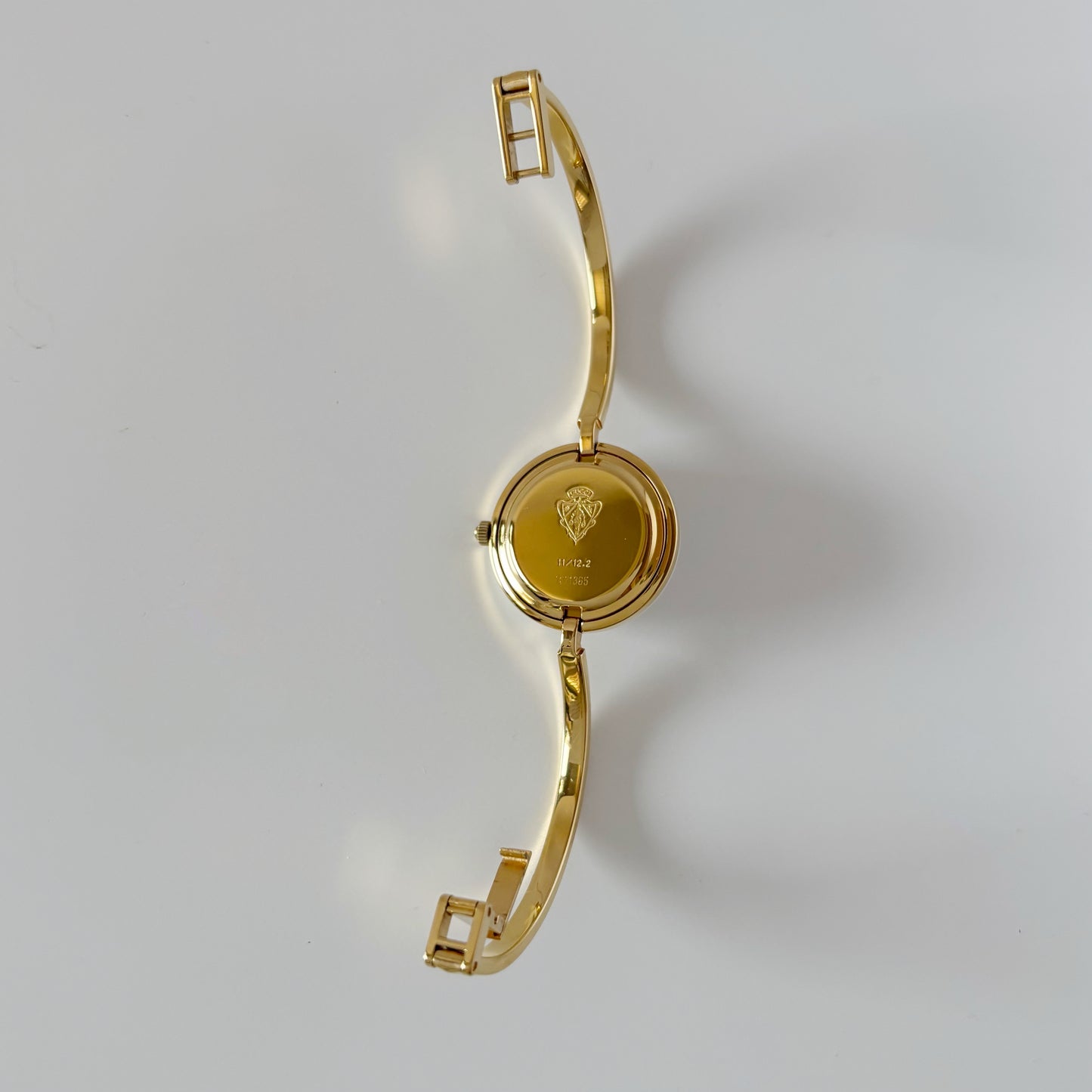 Gucci 1990s Interchangeable Bezel Gold Plated Bangle Watch with 12 bezels, case