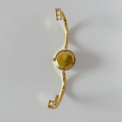 Gucci 1990s Interchangeable Bezel Gold Plated Bangle Watch with 12 bezels, case