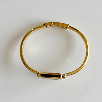Gucci 1990s Square Dial Gold Plated Bangle Watch