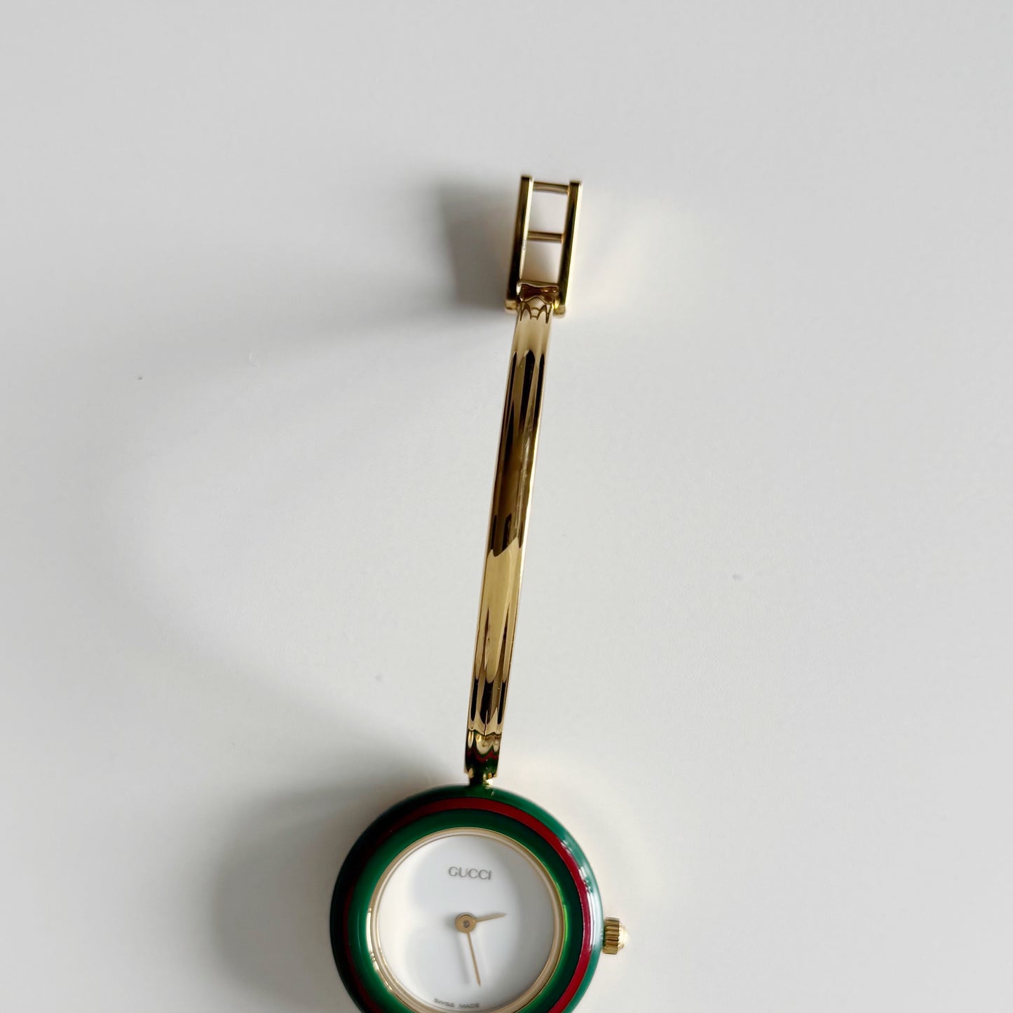 Gucci 1990s Interchangeable Bezel Gold Plated Bangle Watch with 12 bezels, case