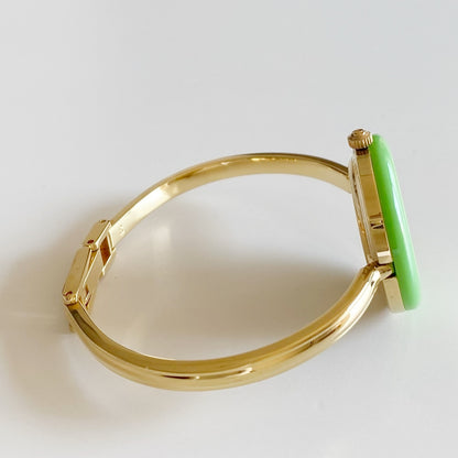 Gucci 1990s Interchangeable Bezel Gold Plated Bangle Watch with 12 bezels, case (Small)