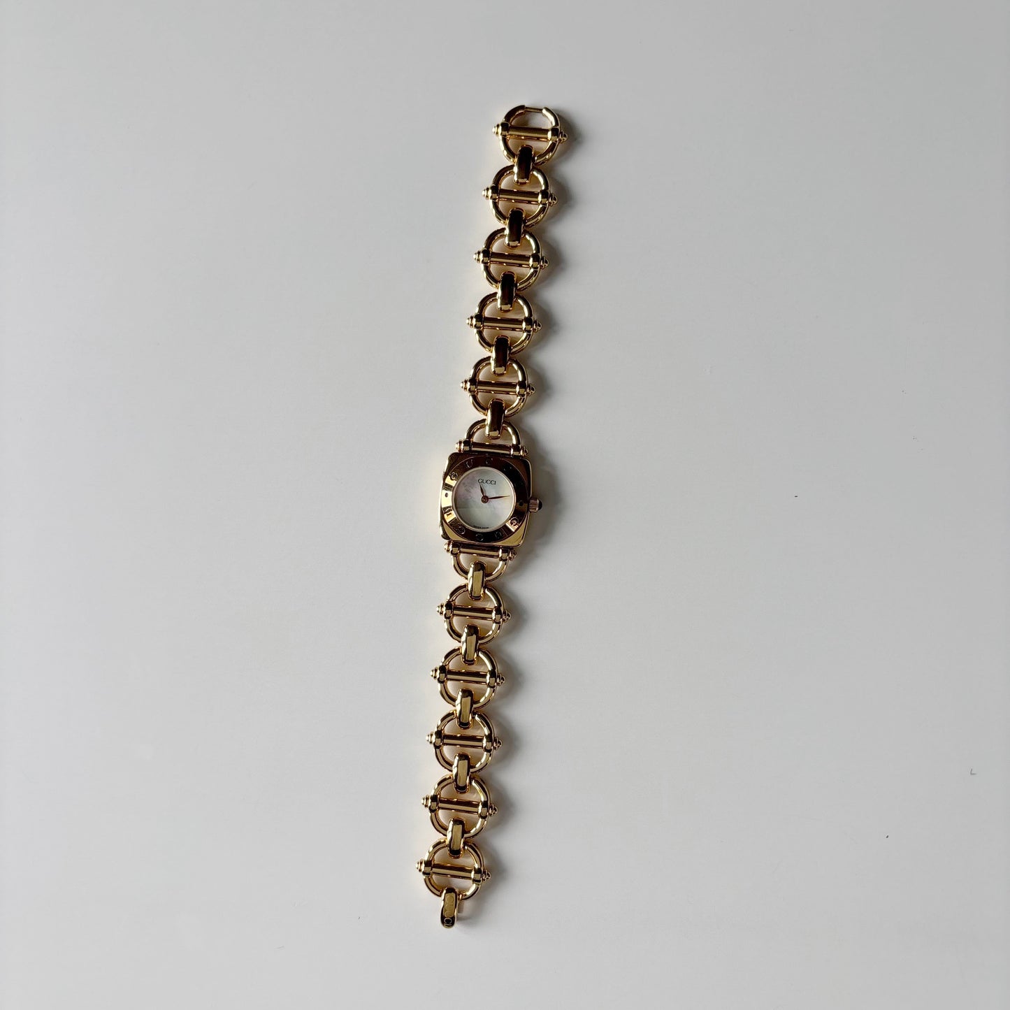 Gucci 1990s Seashell Dial Horsebit Gold Plated Watch