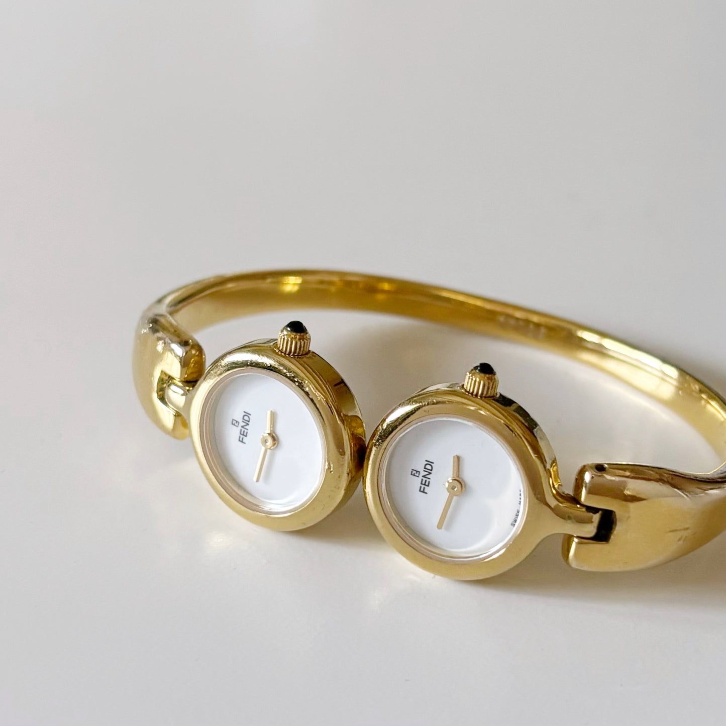 Fendi 1990s Seashell Dial Two Time Zone Gold Plated Bangle Watch