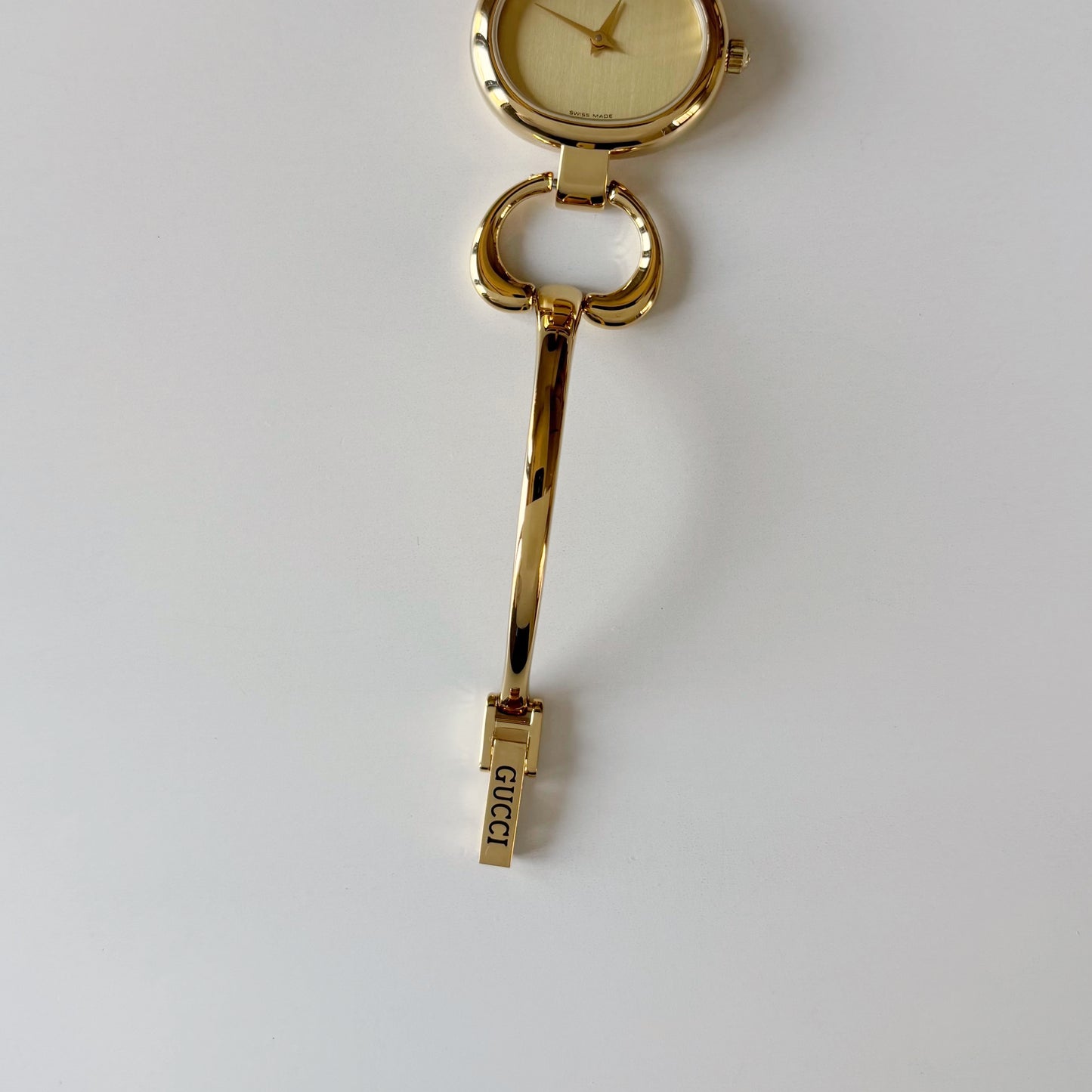 Gucci 1990s Oval Dial Gold Plated Bangle Watch