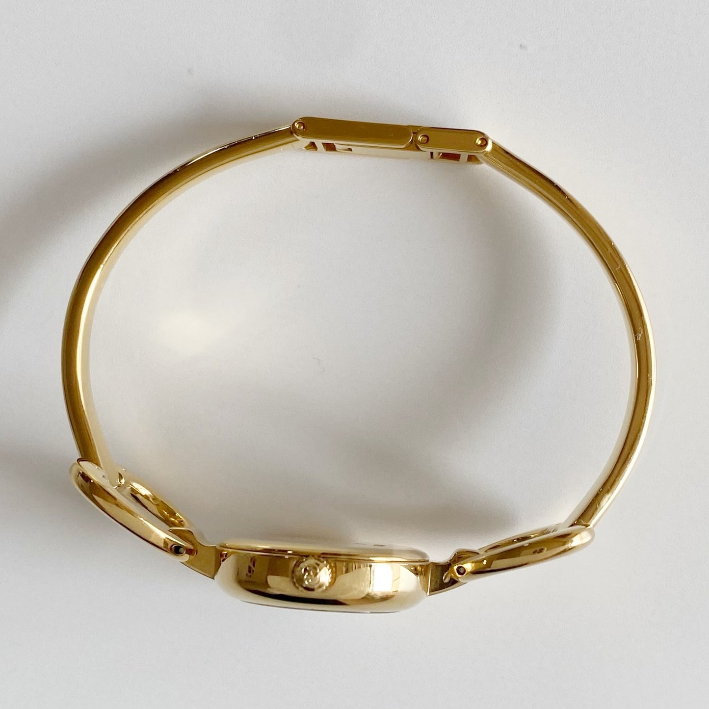 Gucci 1990s Black Dial Gold Plated Bangle Watch