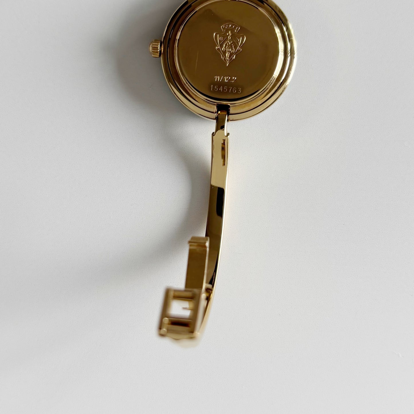 Gucci 1990s Interchangeable Bezel Gold Plated Bangle Watch with 12 bezels, case