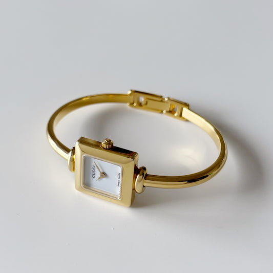 Gucci 1990s Square Dial Gold Plated Bangle Watch