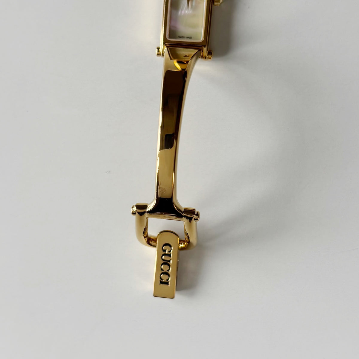 Gucci 1990s Seashell Rectangular Dial Gold Plated Bangle Watch