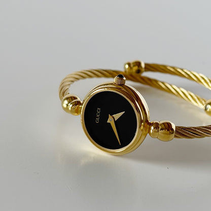 Gucci 1990s Black Dial Gold Plated Cable Bangle Watch