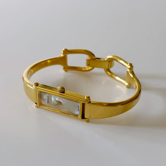 Gucci 1990s Rectangular Seashell Dial Gold Plated Bangle Watch