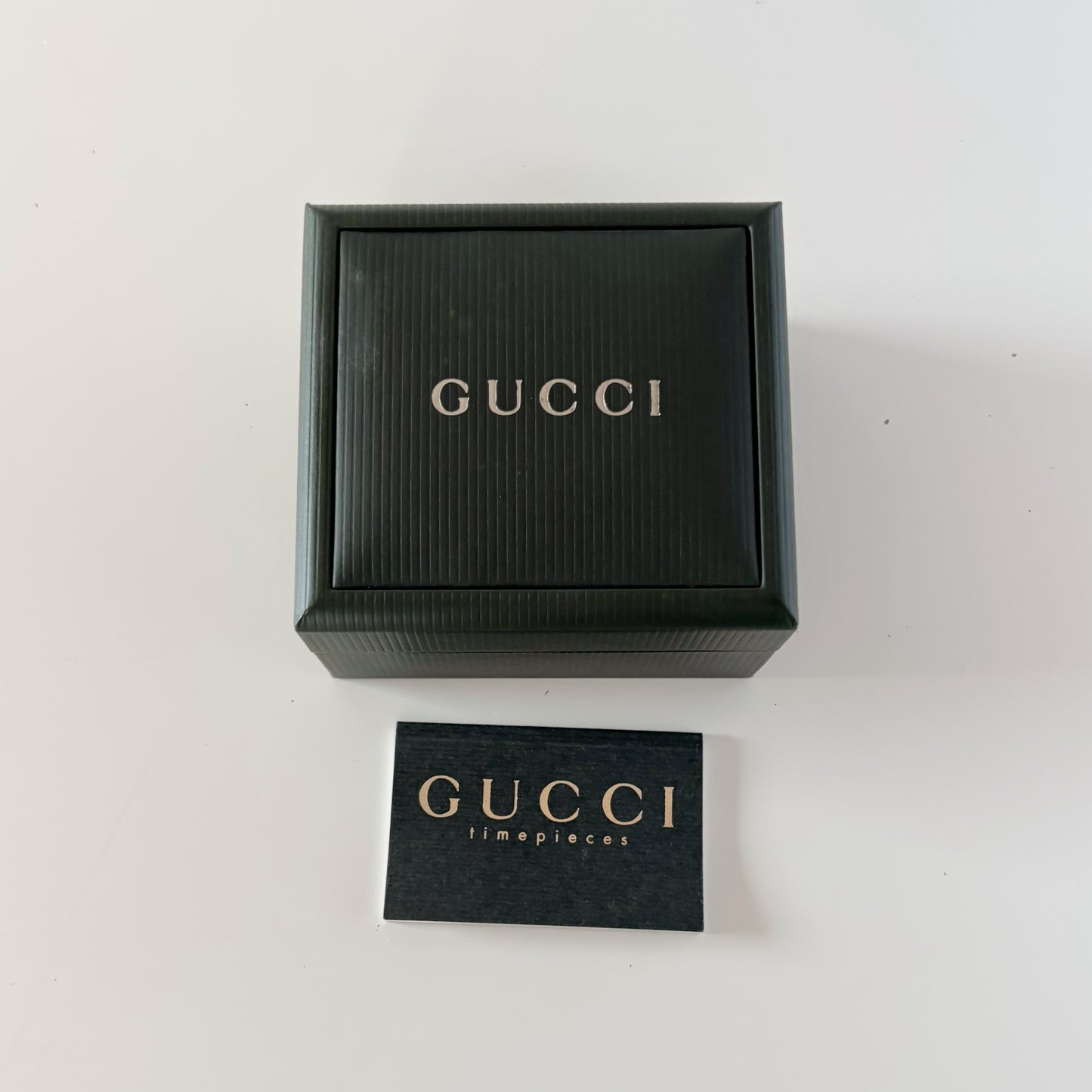Gucci 1990s Gold Rectangular Dial Gold Plated Bangle Watch
