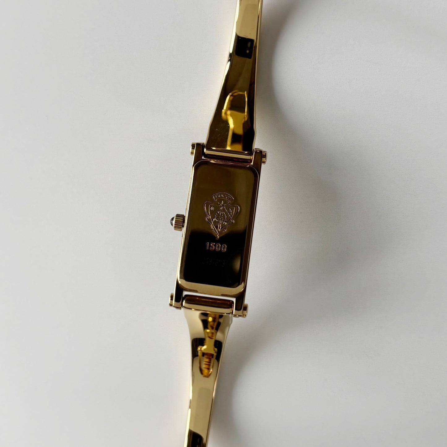 Gucci 1990s Gold Rectangular Dial Gold Plated Bangle Watch