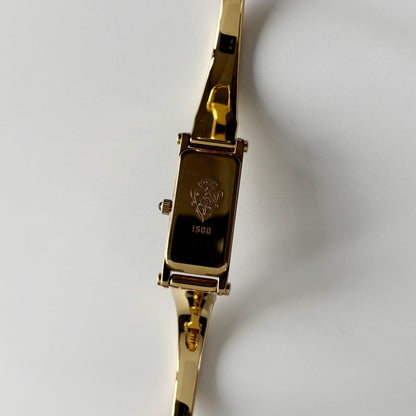 Gucci 1990s Gold Rectangular Dial Gold Plated Bangle Watch