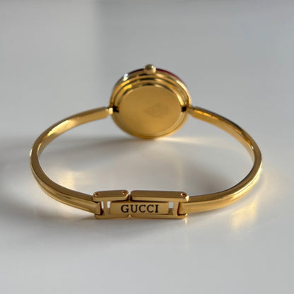 Gucci 1990s Interchangeable Bezel Gold Plated Bangle Watch with 12 bezels, case