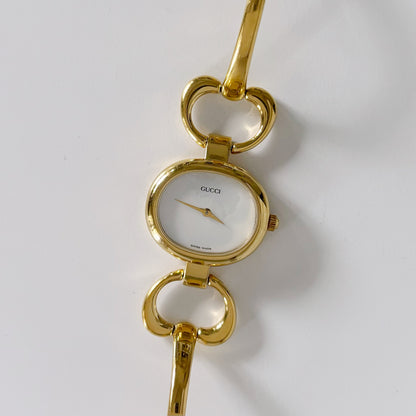 Gucci 1990s Seashell Dial Oval Gold Plated Bangle Watch