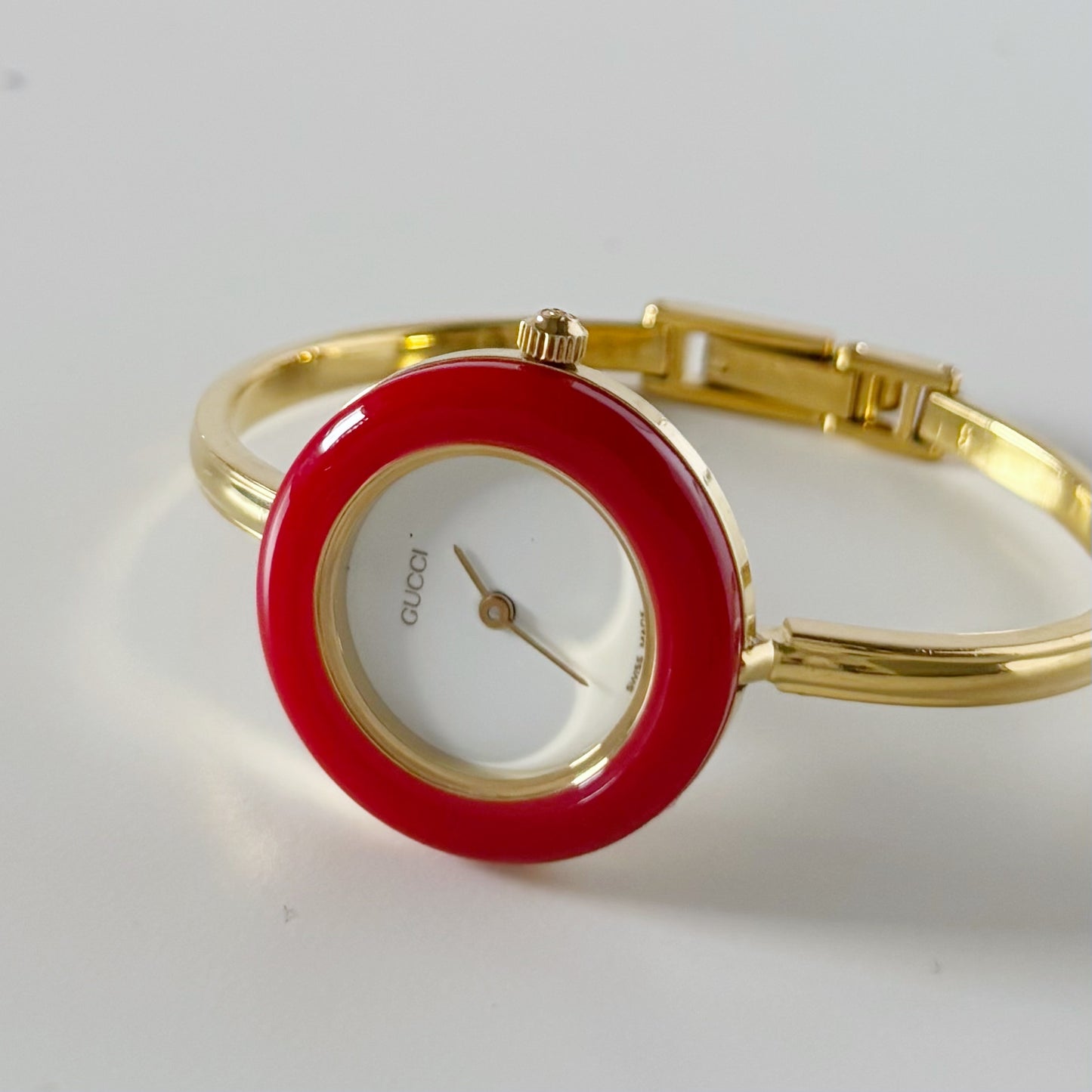 Gucci 1990s Interchangeable Bezel Gold Plated Bangle Watch with 12 bezels, case (Small)