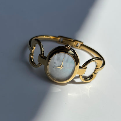 Gucci 1990s Seashell Oval Dial Gold Plated Bangle Watch (Small)