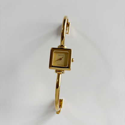 Gucci 1990s Square Dial Gold Plated Bangle Watch (Small)