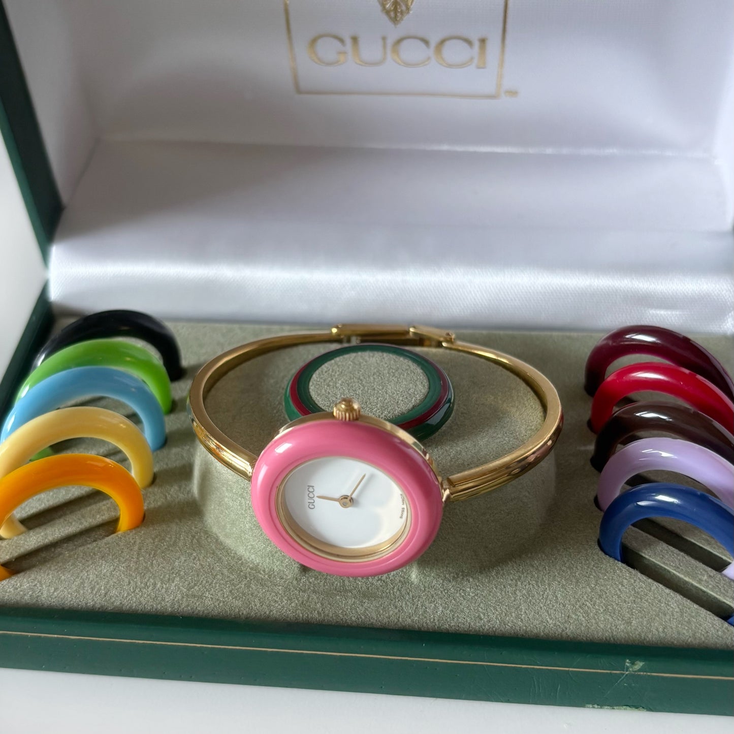 Gucci 1990s Interchangeable Bezel Gold Plated Bangle Watch with 12 bezels, case (Small)
