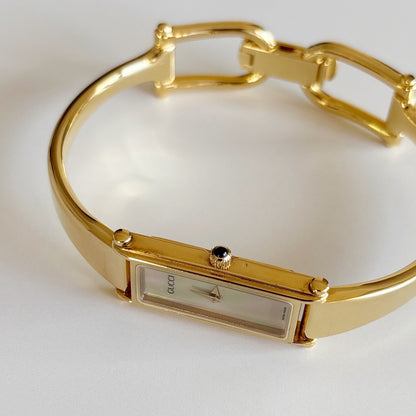 Gucci 1990s Seashell Dial Rectangular Gold Plated Bangle Watch