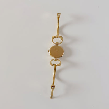Gucci 1990s Seashell Oval Dial Gold-Plated Bangle Watch (Small)