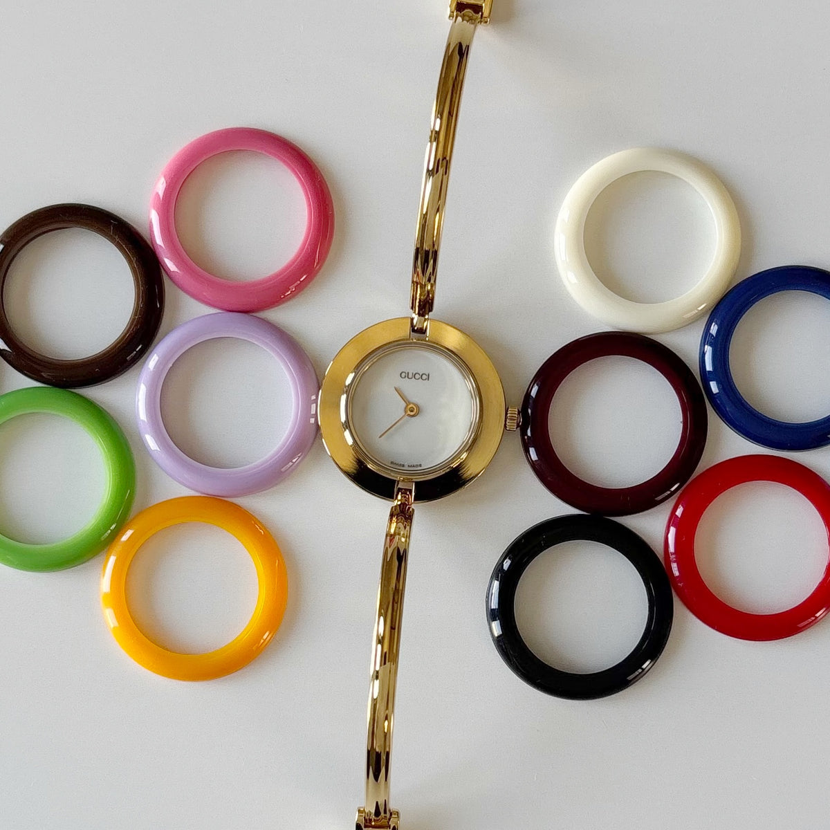Gucci 1990s Interchangeable Bezel Gold Plated Bangle Watch with 12 bezels, case (Small)