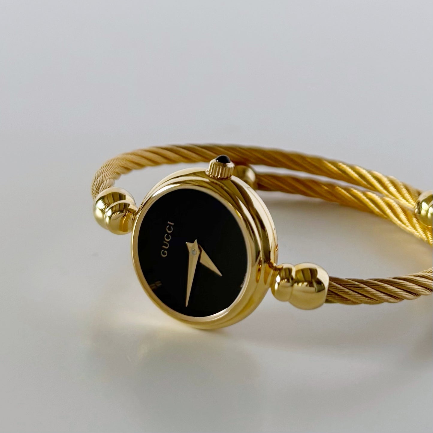 Gucci 1990s Black Dial Gold Plated Cable Band Bangle Watch
