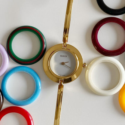 Gucci 1990s Interchangeable Bezel Gold Plated Bangle Watch with 12 bezels, case