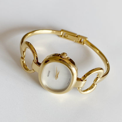 Gucci 1990s Seashell Dial Gold Plated Bangle Watch