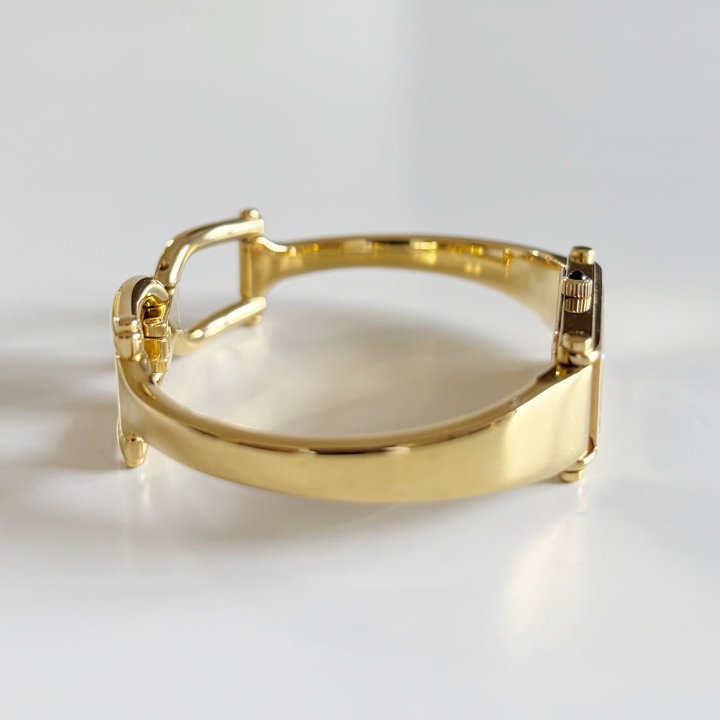 Gucci 1990s Black Dial Rectangular Gold Plated Bangle Watch