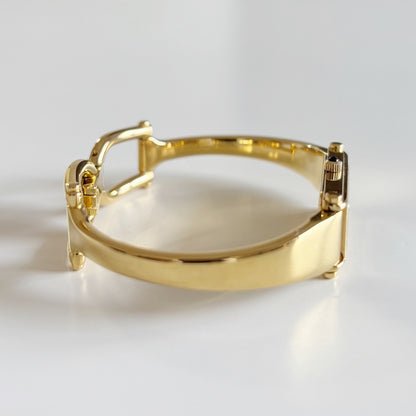 Gucci 1990s Black Dial Rectangular Gold Plated Bangle Watch