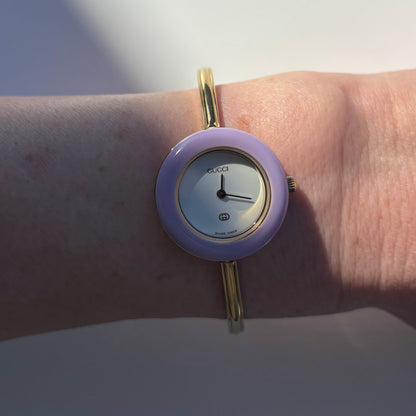 Gucci 1990s Interchangeable Bezel Gold Plated Bangle Watch with 12 bezels, case