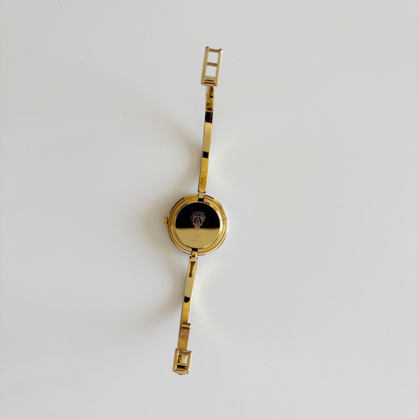 Gucci 1990s Interchangeable Bezel Gold Plated Bangle Watch with 12 bezels, case