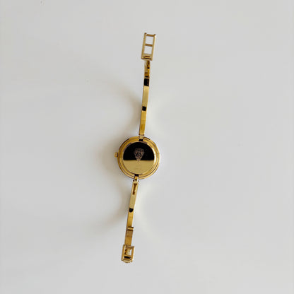 Gucci 1990s Interchangeable Bezel Gold Plated Bangle Watch with 12 bezels, case