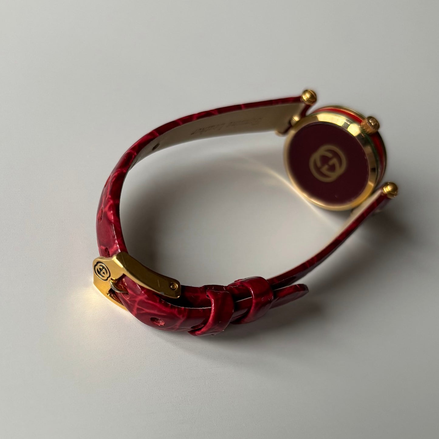 Gucci 1990s Red Dial Sherry Gold Plated Watch