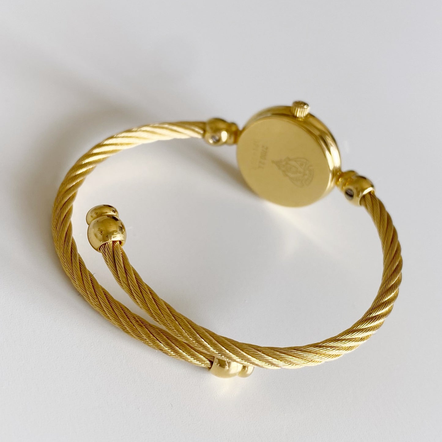 Gucci 1990s Seashell Dial Gold Plated Bangle Watch