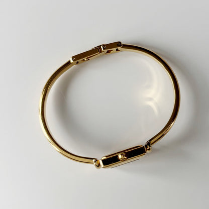 Gucci 1990s Square Dial Gold Plated Bangle Watch