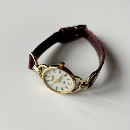 Gucci 1980s Cream Round Dial Horsebit Gold-Plated Watch