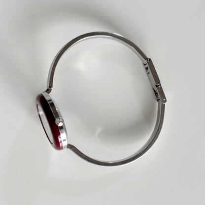 Gucci 1990s Interchangeable Bezel Stainless steel Bangle Watch with 12 bezels, case