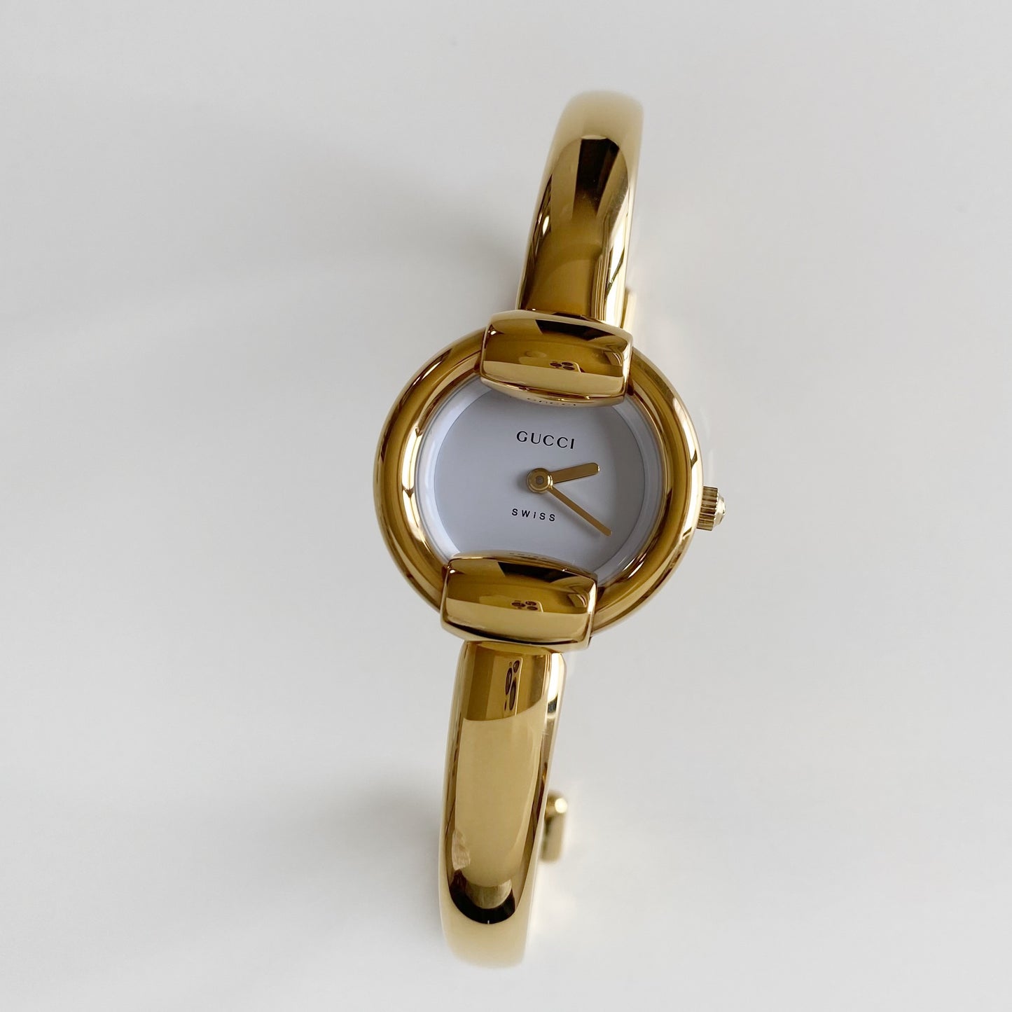 Gucci 1990s Round Dial Gold Plated Bangle Watch