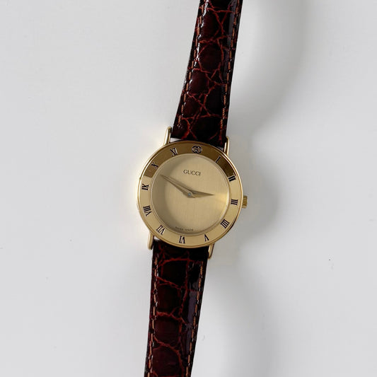 Gucci 1990s Gold Plated Round Watch
