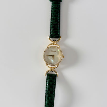 Gucci 1990s Seashell Dial Horsebit Watch