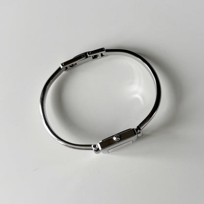 Gucci 1990s Square Dial Silver Bangle Watch