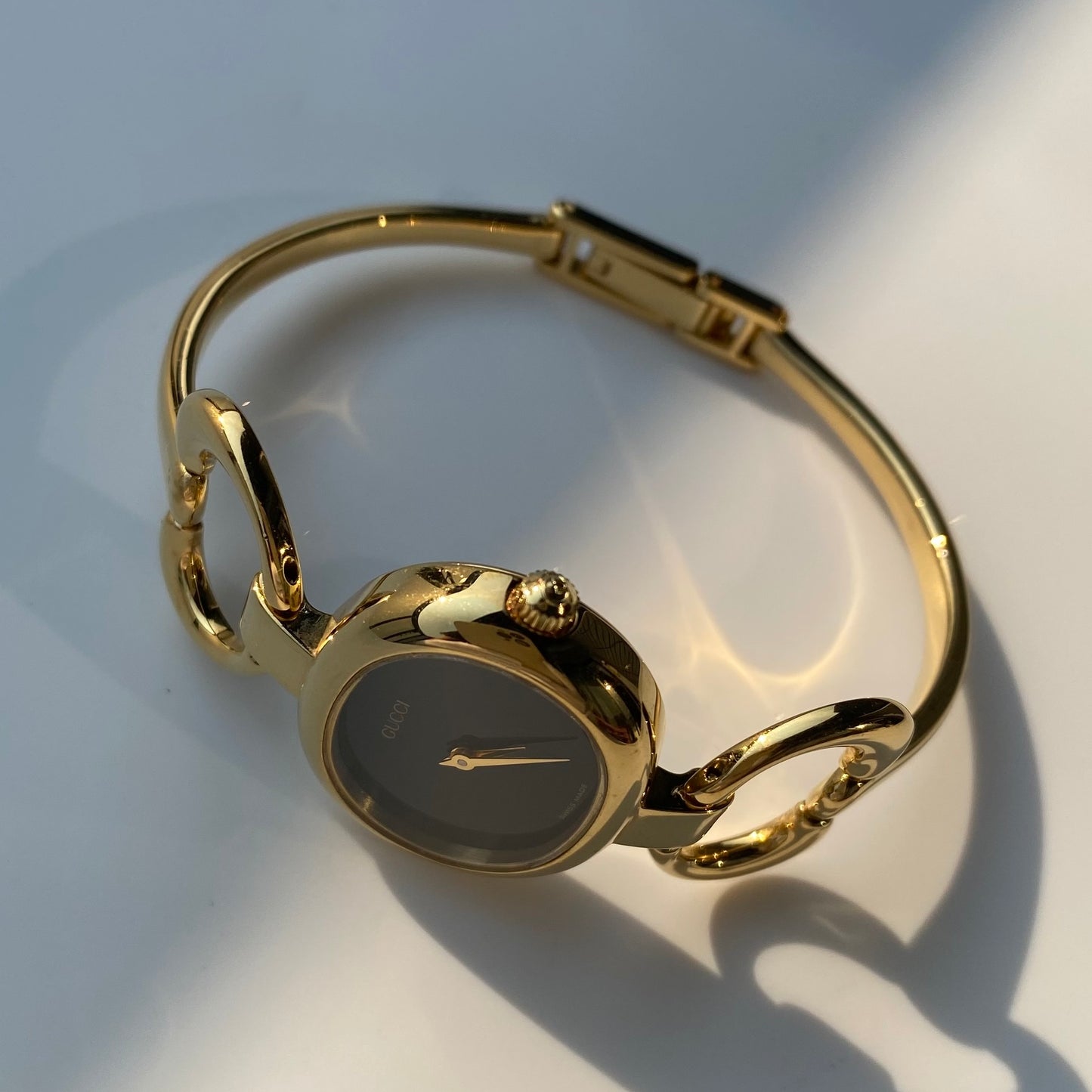 Gucci 1990s Black Dial Gold Plated Bangle Watch