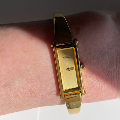 Gucci 1990s Gold Dial Rectangular  Gold Plated Bangle Watch