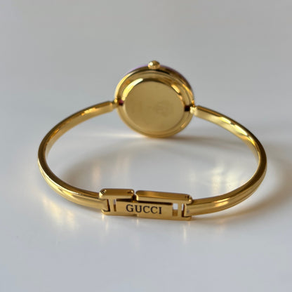 Gucci 1990s Interchangeable Bezel Gold Plated Bangle Watch with 12 bezels, case