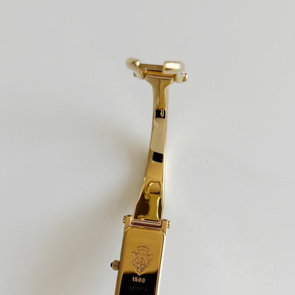 Gucci 1990s Rectangular Dial Gold Plated Bangle Watch