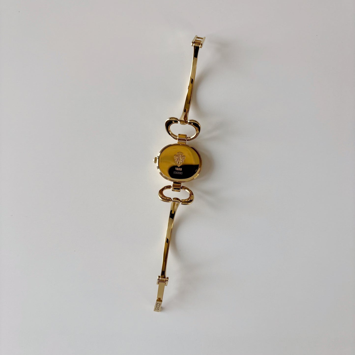 Gucci 1990s Oval Dial Gold Plated Bangle Watch